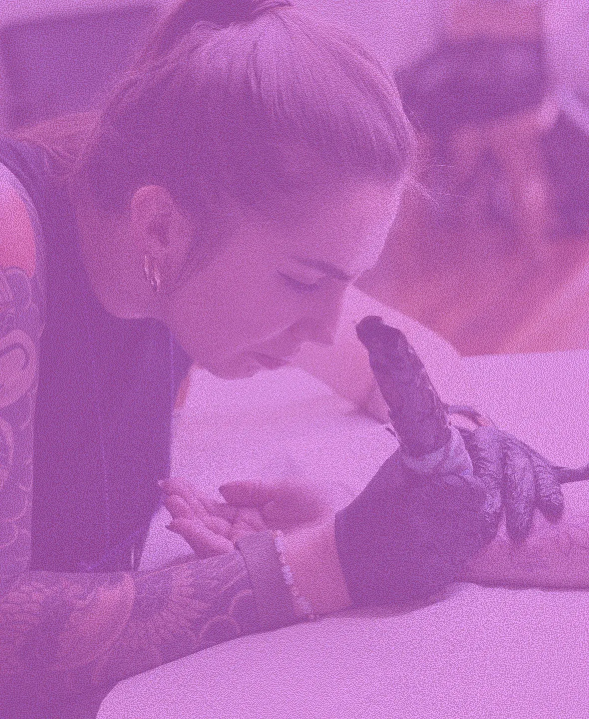 Tattoo artist at work with Protat’s lilac image treatment
