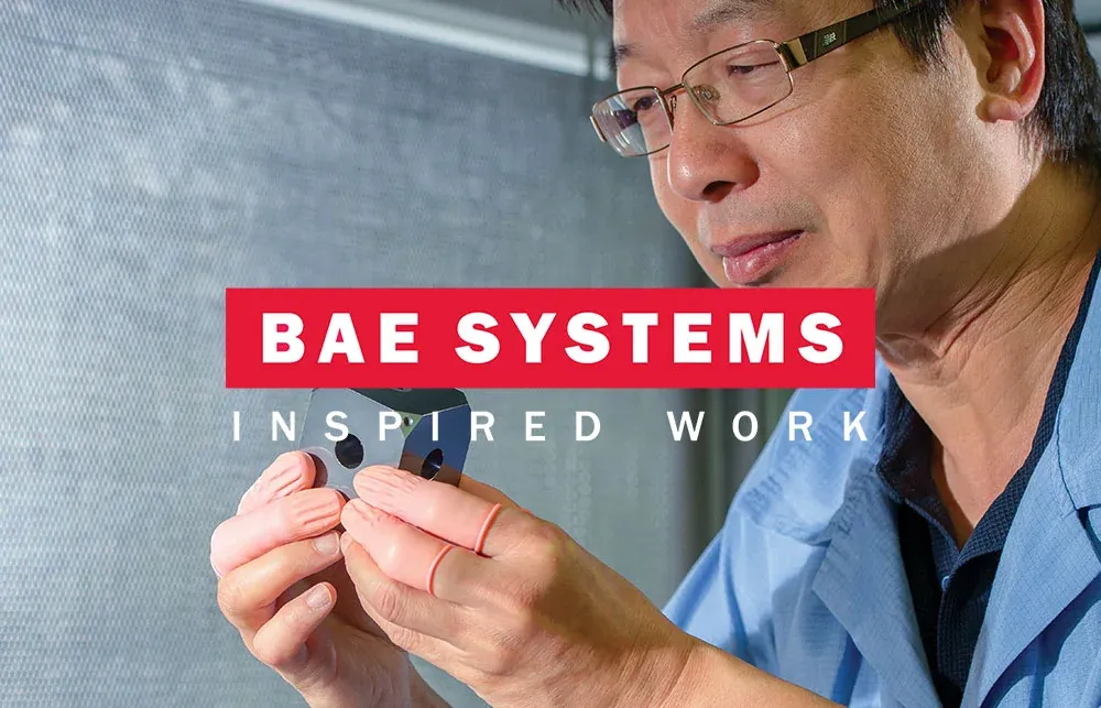 BAE Systems Inspired Work identity over a photograph of a specialist inspecting a precision component